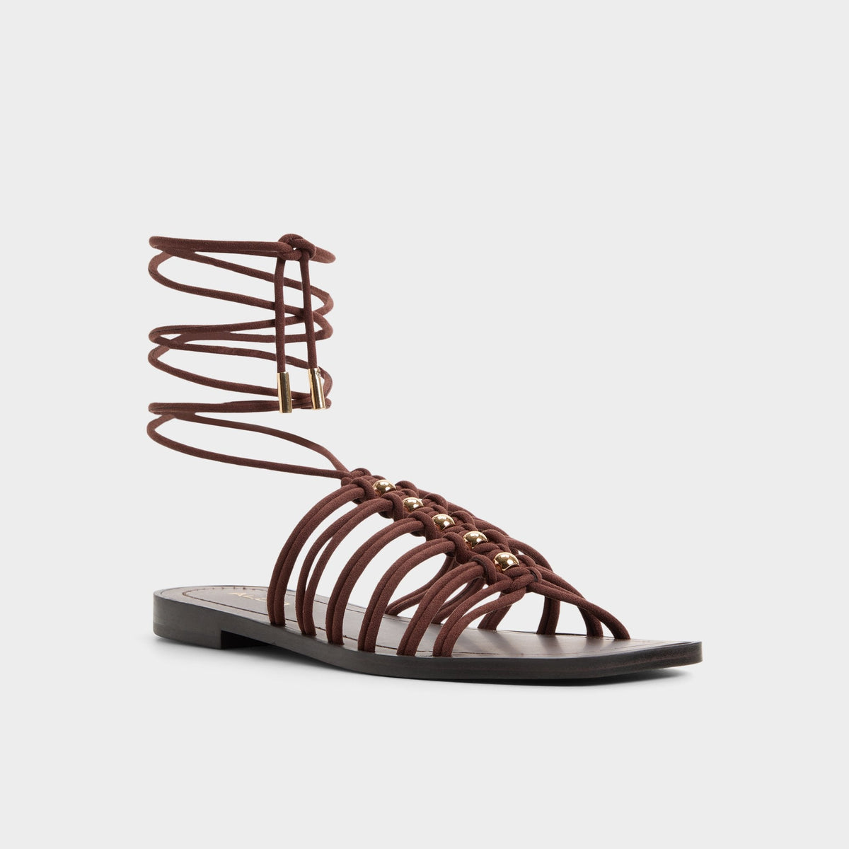 Unoma in Dark Brown - Strappy flat sandal | Aldo