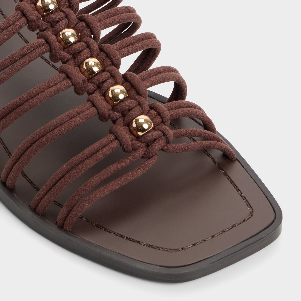 Unoma in Dark Brown - Strappy flat sandal | Aldo