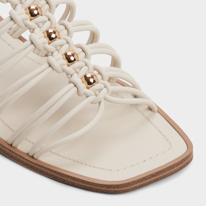 Unoma in White Bone - Strappy flat sandal | Aldo